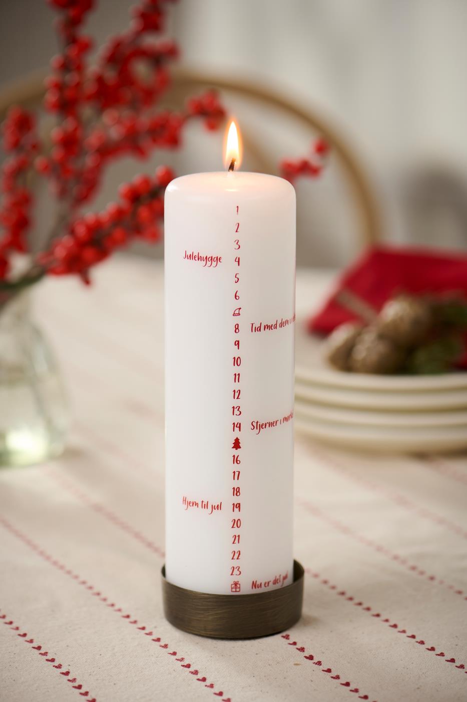 Kalenderkerze 1–24 von Ib Laursen, dänischer Text